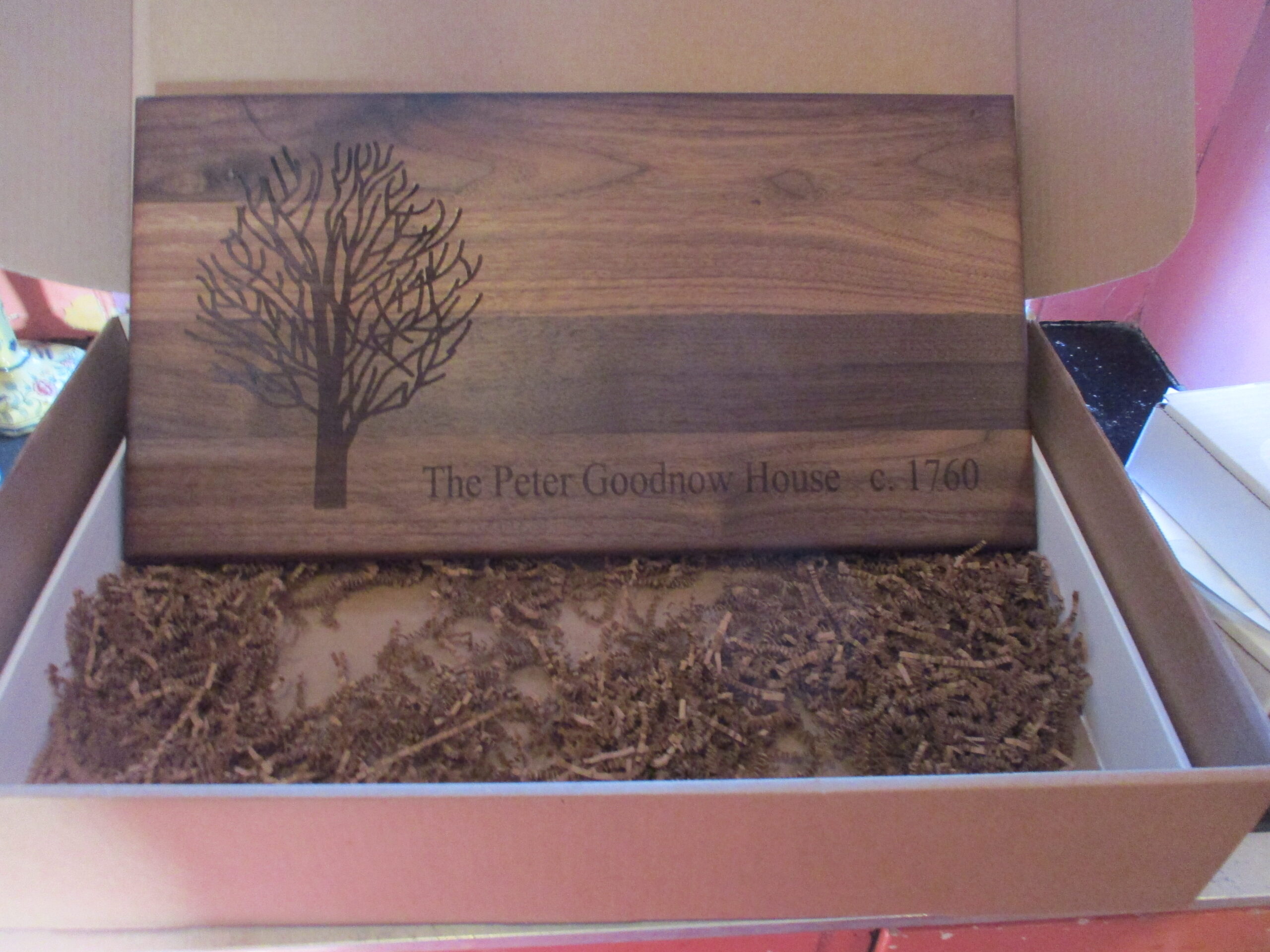 Commissioned custom engraved dry tree on walnut cutting board/charcuterie board as a closing gift.