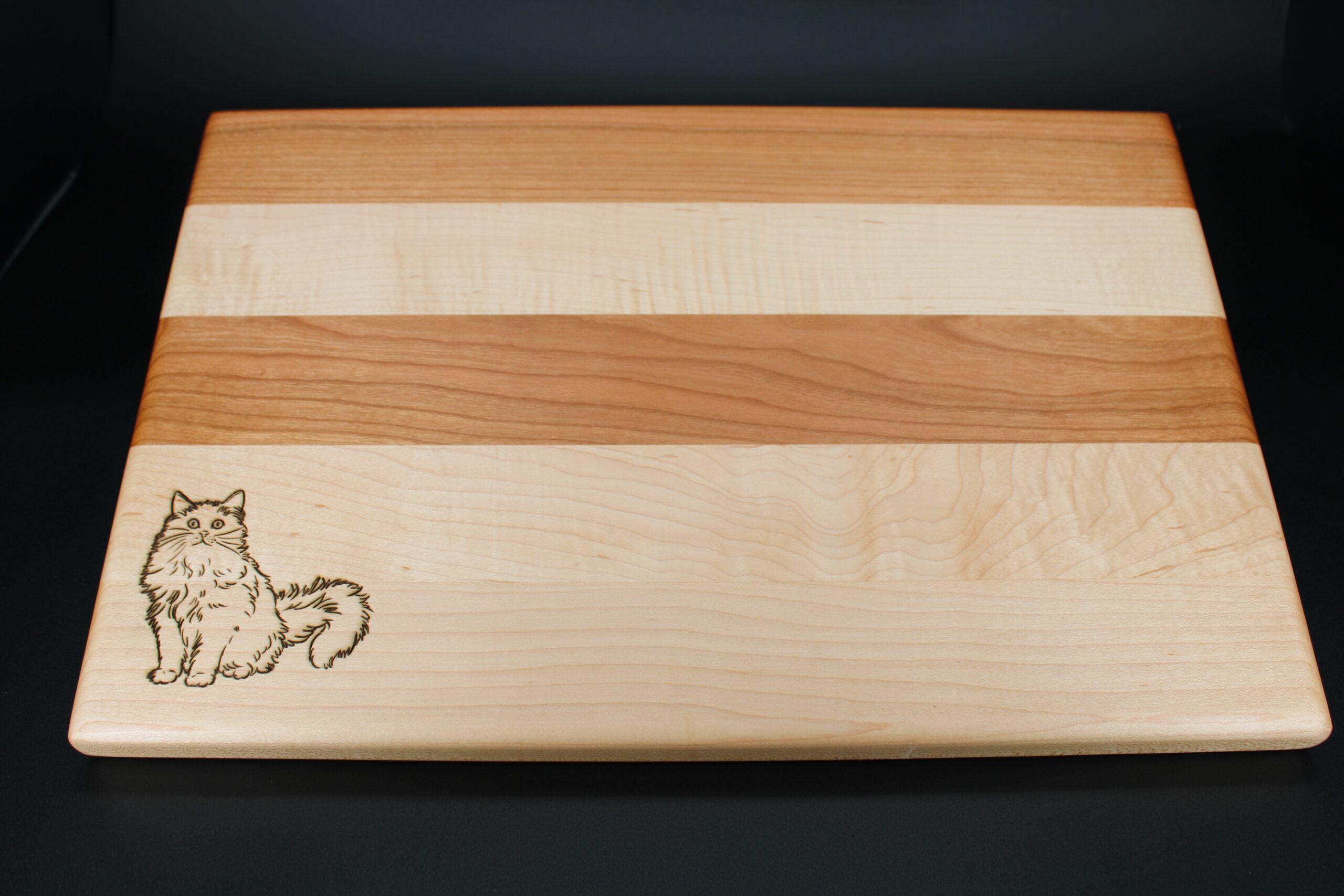Maple and Cherry charcuterie board/ cutting board with a cat as a birthday gift.